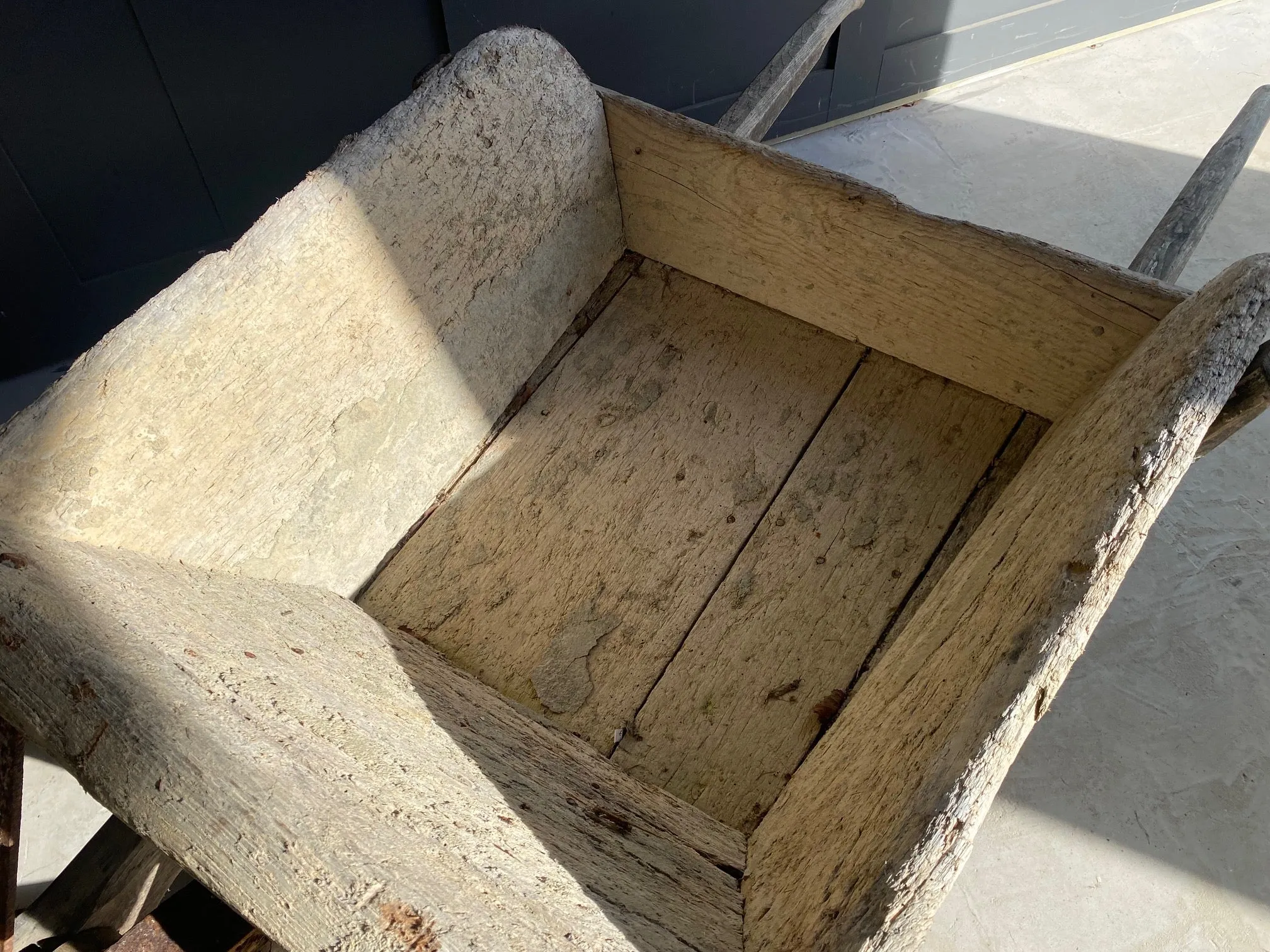 French rustic wooden wheelbarrow